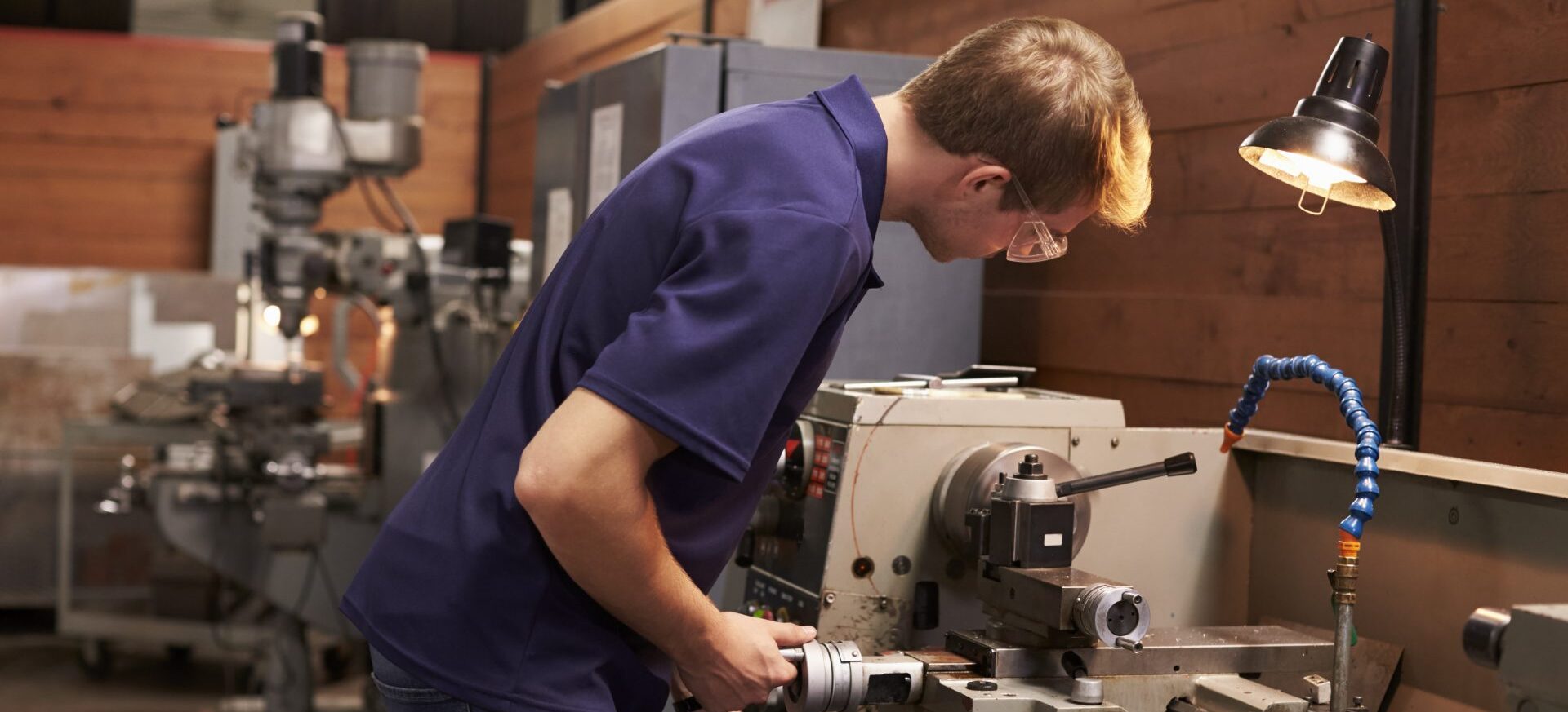 male-engineer-in-factory-using-milling-machine-2021-08-26-16-13-07-utc